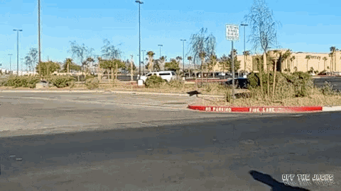 an empty parking lot with a no parking fire lane