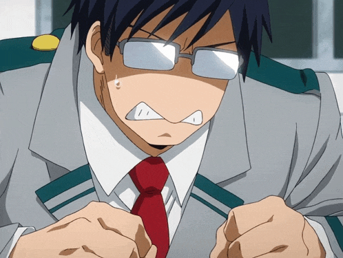 a man with glasses and a red tie looks angry
