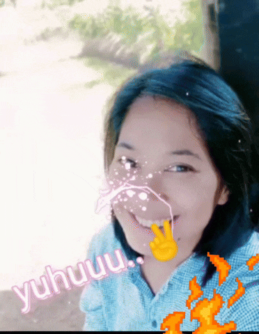 a girl is smiling with the word yuhuuu on the bottom right