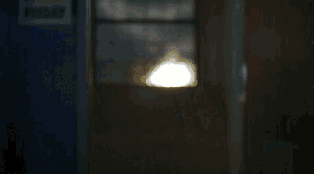 a cheerleader is standing in front of a door that says friday