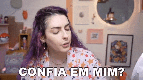 a woman with purple hair and a nose ring is sitting in a room with her eyes closed and says confia em mim ?