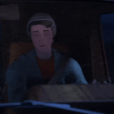 a person sitting in a car with a blue light coming out of the window