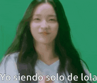 a close up of a woman 's face with the words yo siendo solo de lola written on it .