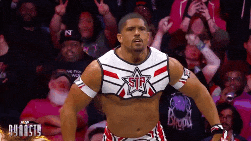 a wrestler with the word star on his shirt
