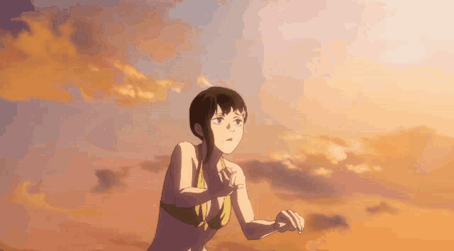a girl in a bikini stands in front of an orange sky