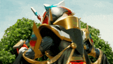 a close up of a superhero with a sword and shield