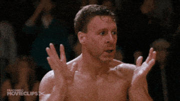 a man without a shirt is making a funny face in front of a fandango movieclips logo