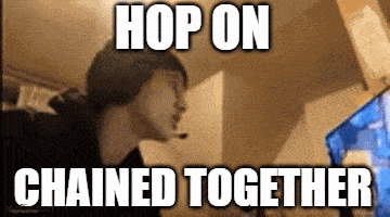 a man sitting in front of a computer with the words hop on chained together written on the screen