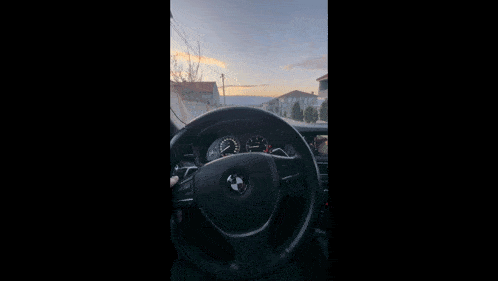 the steering wheel of a bmw is shown in a close up