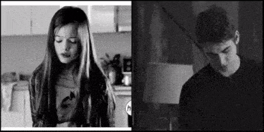 a girl and a boy are standing next to each other in a kitchen .