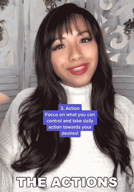 a woman in a white sweater with the words the actions above her