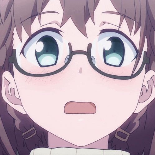 a close up of a girl 's face with glasses
