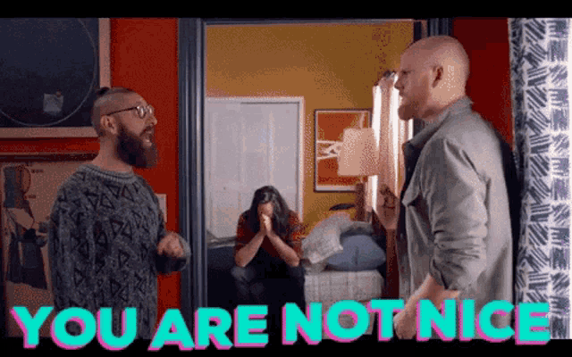 two men standing next to each other with the words you are not nice