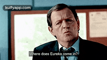 a man in a suit and tie asking where does eureka come in