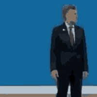 a man in a suit is standing in front of a blue wall .