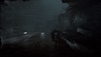 a person is standing in the dark with a lightning bolt coming from the sky .