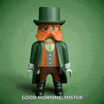 a playmobil leprechaun with an orange beard and top hat says good morning mister .