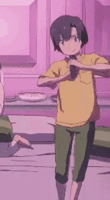a boy in a yellow shirt and green pants is standing in a room holding a bottle .