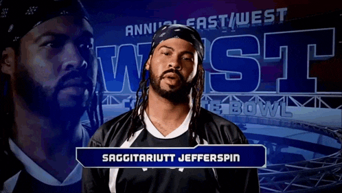 a man with dreadlocks is standing in front of a sign that says west