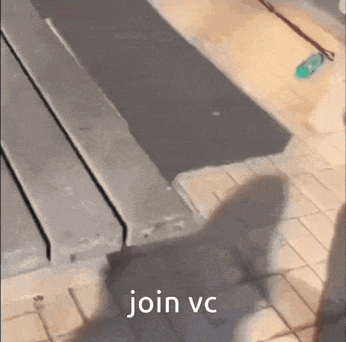 a cat 's shadow is cast on a wooden bench with the words join vc written on the bottom