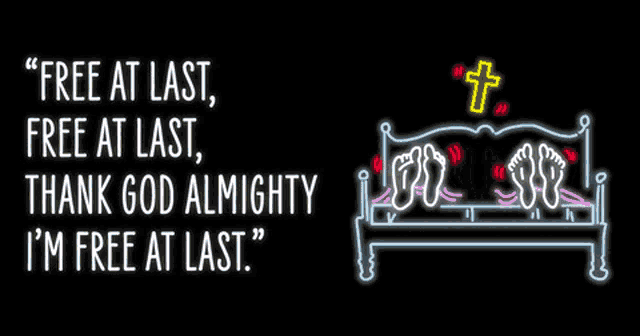 a neon sign that says ' free at last free at last thank god almighty i 'm free at last ' on it