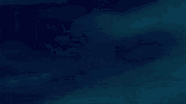 a cartoon character is running in the dark with a sword in his hand .