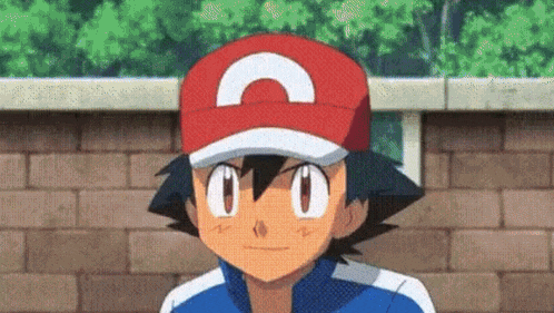 a close up of a cartoon character wearing a hat with a c on it .