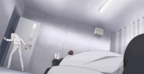 a man in a white shirt is standing in a room with a door