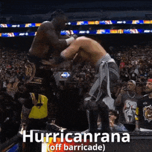 a wrestling match with the words hurricane off barricade