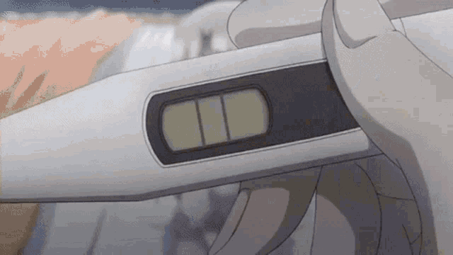 a person is holding a thermometer in their hand and it shows a negative result