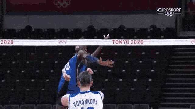 a volleyball game is being played in tokyo in 2020
