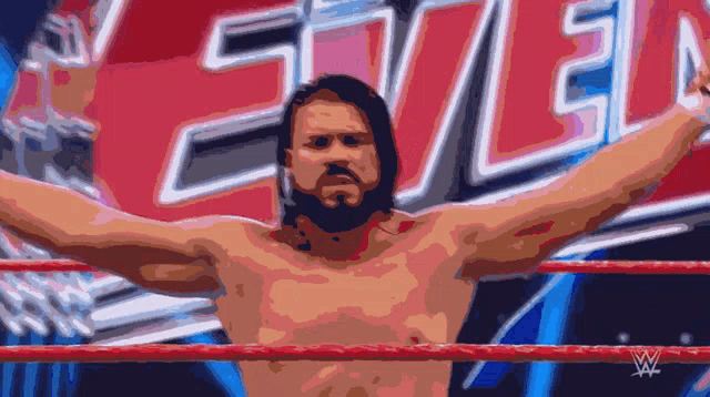 a shirtless wrestler stands in a ring with his arms outstretched in front of a sign that says evil