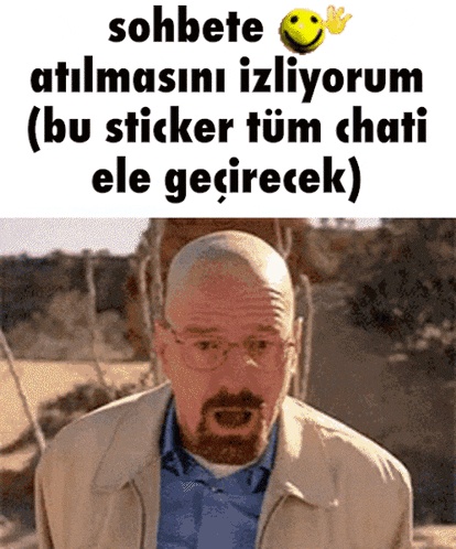 a bald man with glasses and a beard is standing in front of a sign that says sohbete atilmasini izliyorum