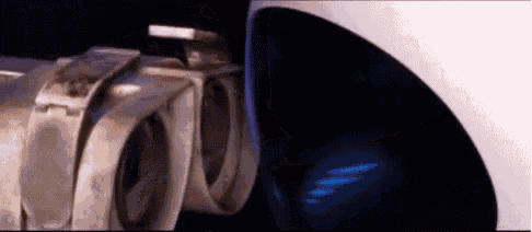 a close up of the exhaust pipe of a car with a blue light coming out of it .