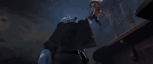 a cat is holding a sword in its mouth