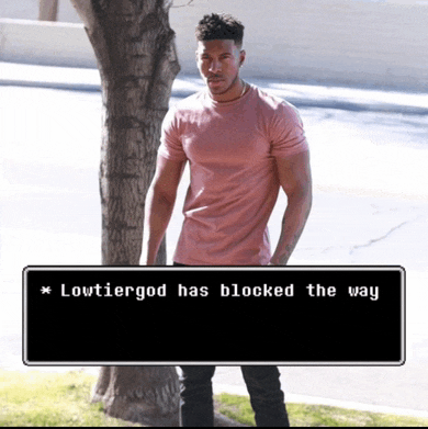 a man in a pink shirt is standing next to a tree with a message that lowtiergod has blocked the way