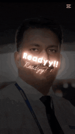 a man 's face is lit up with the words ready !! ready !!