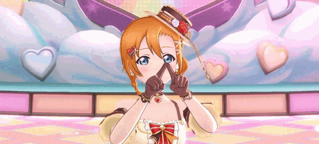 a girl in a hat and gloves is making a heart with her fingers