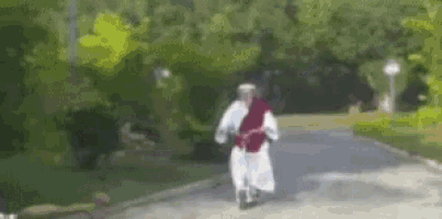 a blurred image of a person walking down a road .