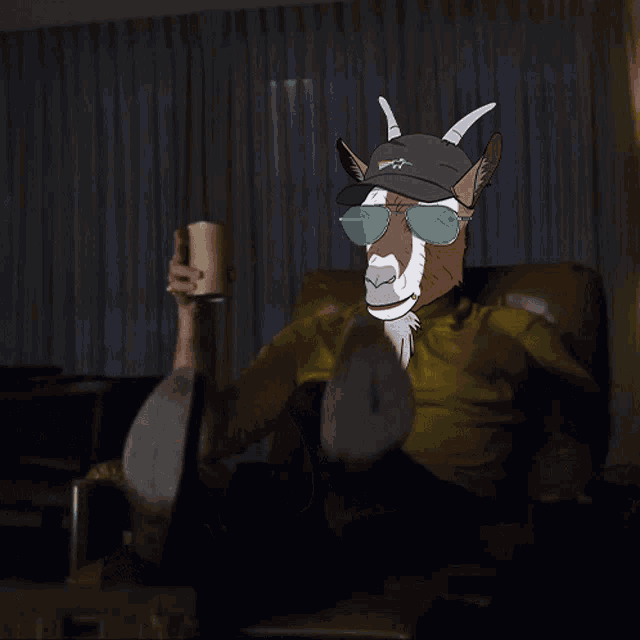 a goat wearing sunglasses and a hat is pointing at something