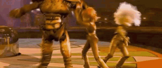 a group of cartoon characters are dancing on a stage in a room .