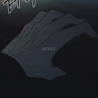 a blurred image of a person 's face with a glowing hand in the foreground