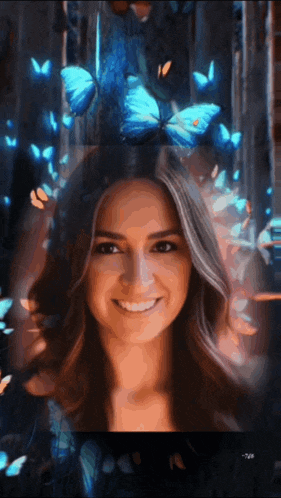 a woman with blue butterflies on her head smiles