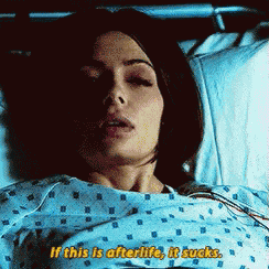 a woman is laying in a hospital bed with the words if this is afterlife it sucks