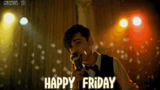 a man singing into a microphone with the words happy friday