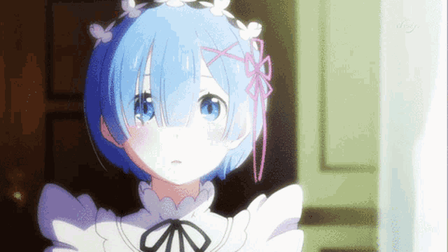 a close up of a girl with blue hair and a bow on her head