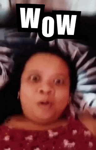 a woman with a surprised look on her face and the word wow above her