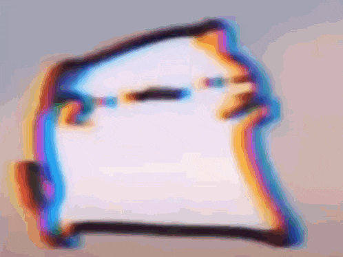 a blurry picture of a person 's face with a rainbow background