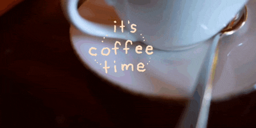 a cup of coffee on a saucer with the words it 's coffee time written on it