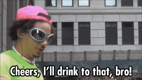 a man wearing sunglasses and a pink hat says cheers i 'll drink to that bro!